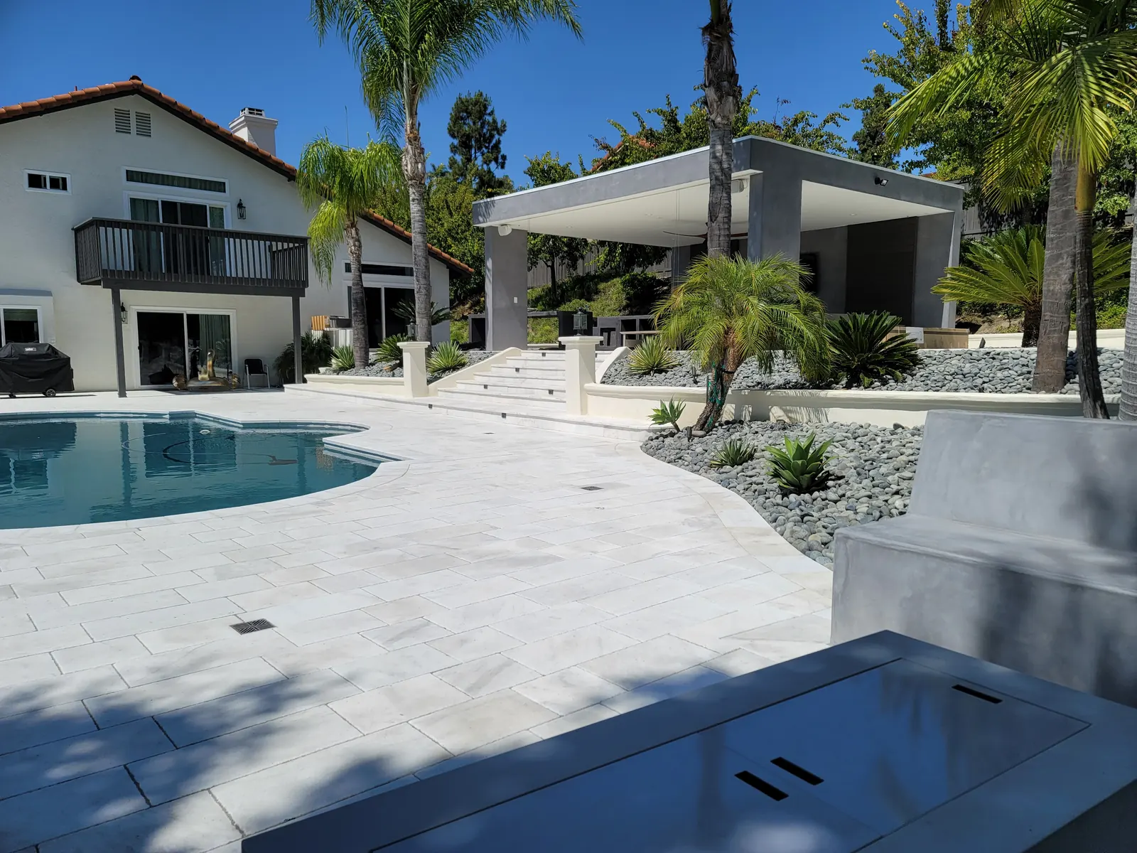 Modern pool deck and outdoor pavilion